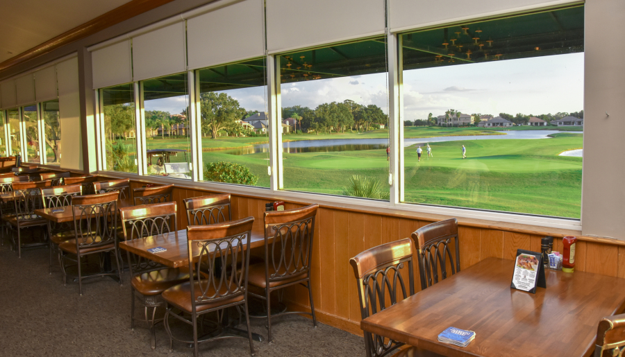 dining table with view of the course